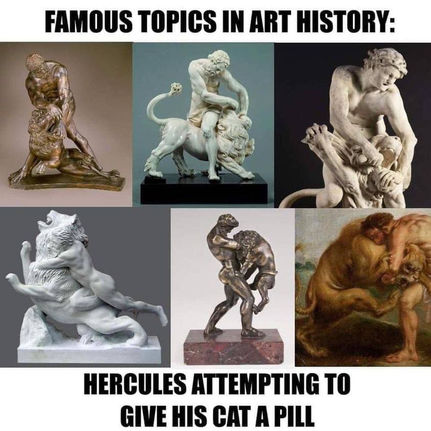 Hercules giving his cat a pill.jpg