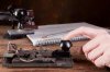 4691445-hand-tapping-morse-code-on-an-antique-telegraph-machine.jpg