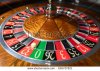 stock-photo-american-roulette-wheel-with-a-ball-in-the-number-655727821.jpg